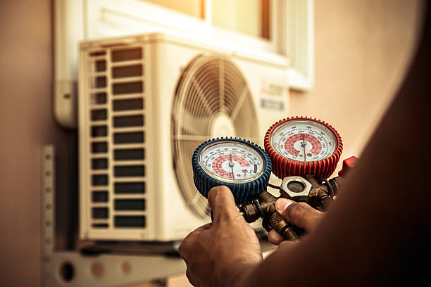 Professional Air Conditioning Service technician working in Lexington, MI